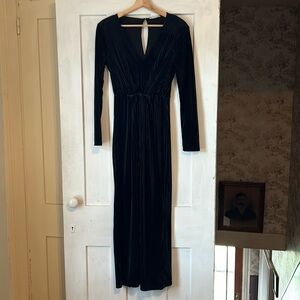 Black ribbed velvet jumpsuit with long sleeves